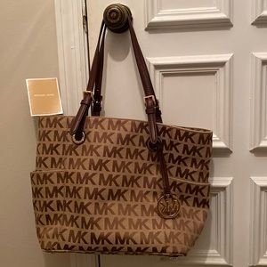 Michael Kors brown signature bag with letters